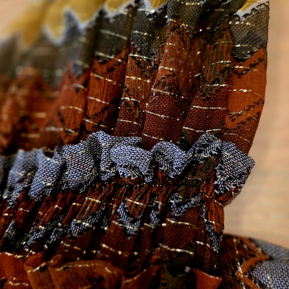 Beautiful See Through Top With Patterned Fabric With Gold Threads.